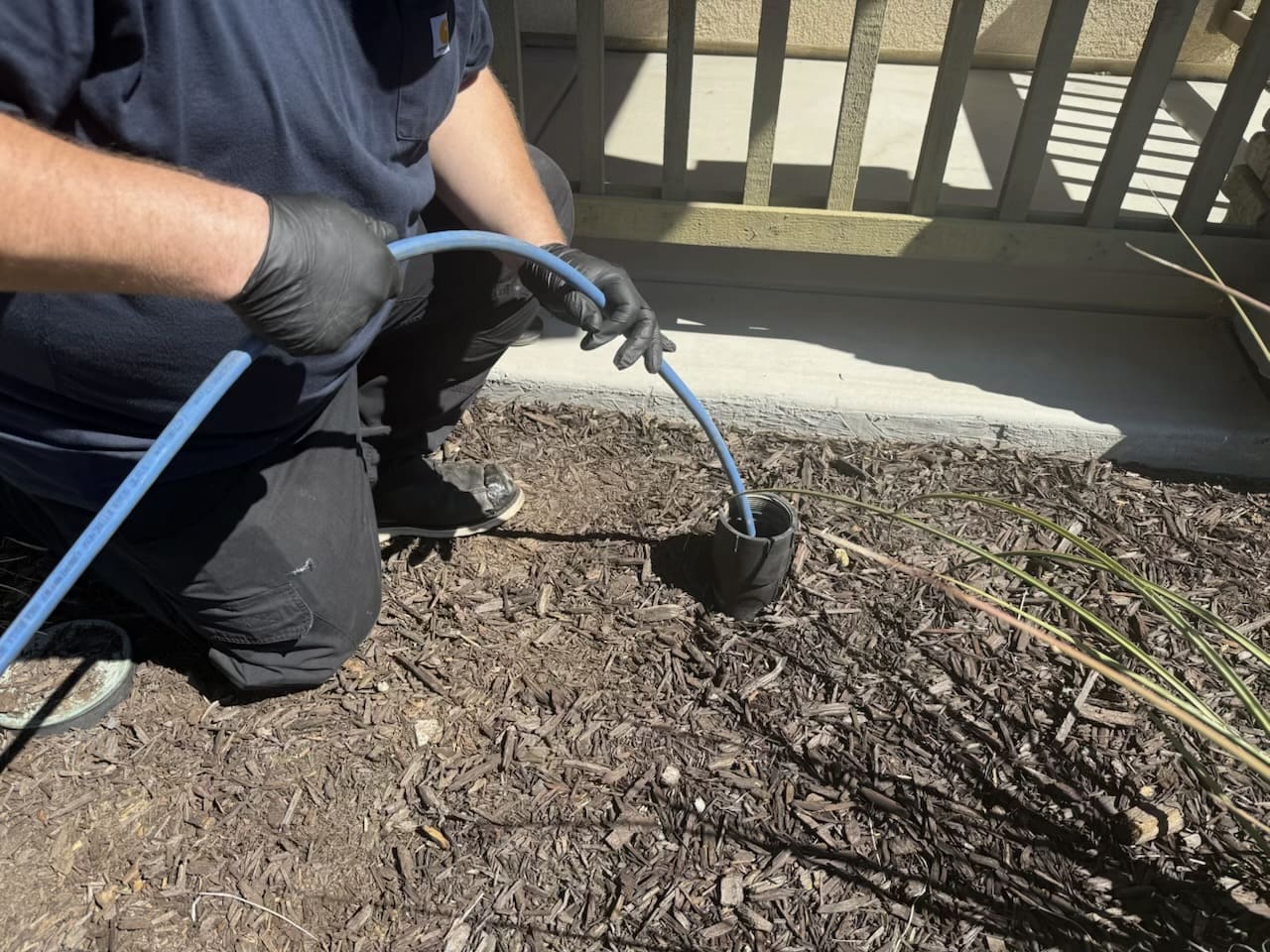 Hydro Plumbing performing professional hydro jetting through an exterior drain cleanout in Murrieta, California.