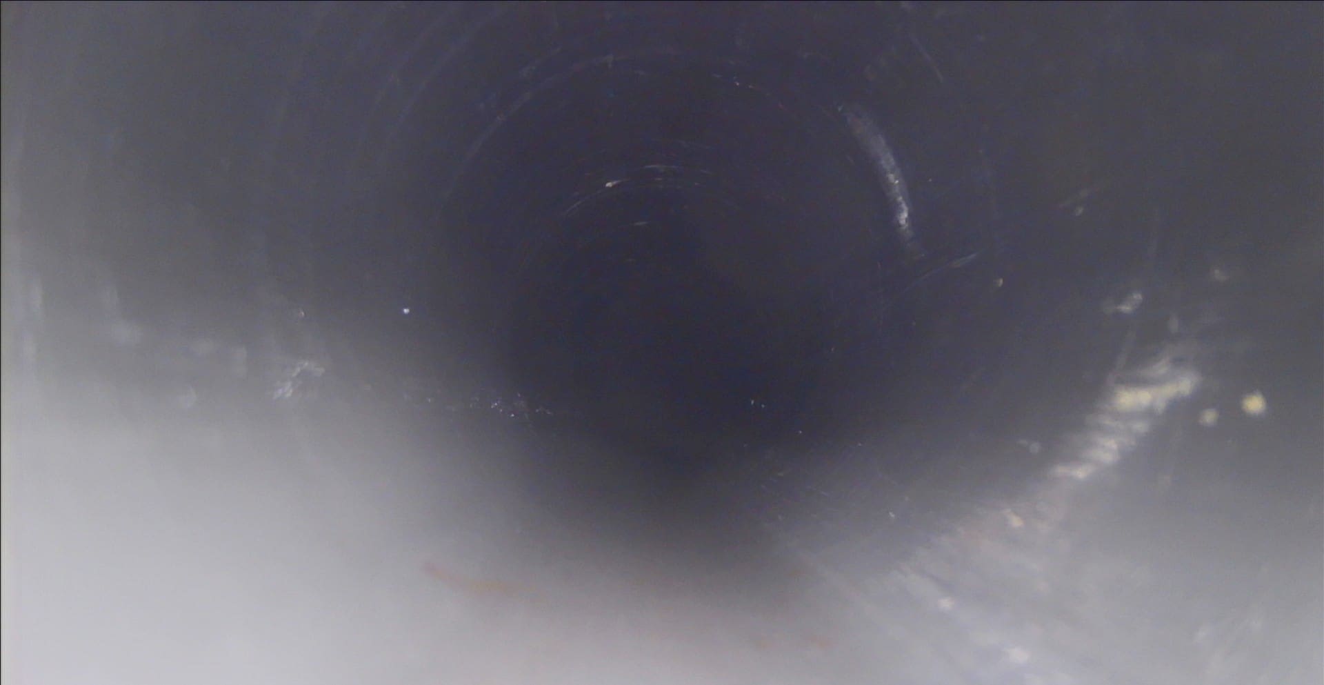 Drain line after professional hydro jetting showing a clean pipe interior in Murrieta and Temecula California.