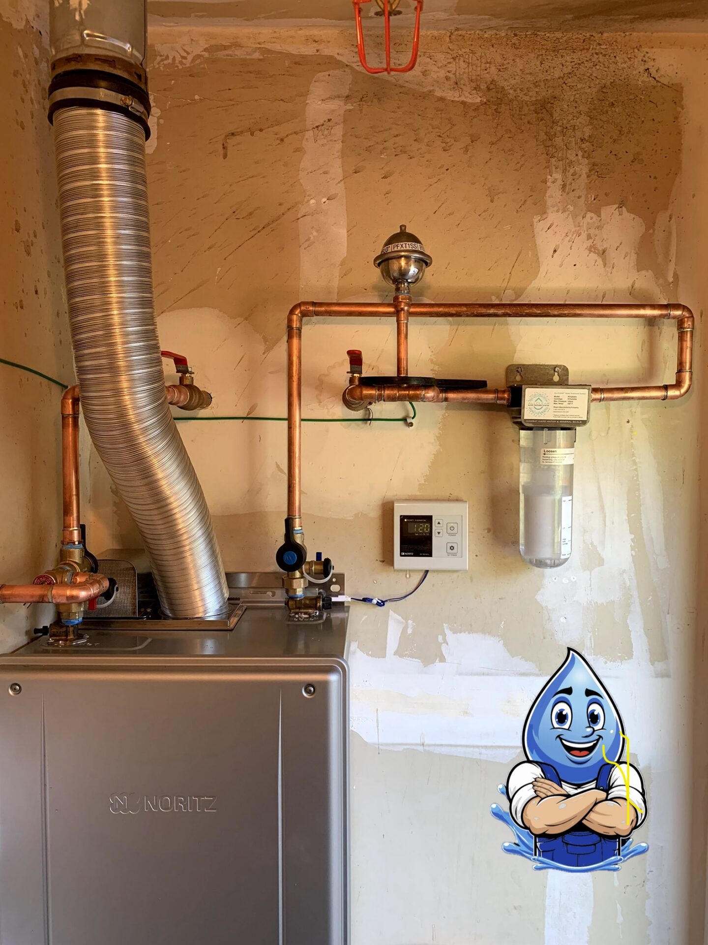 New Noritz tankless water heater professionally installed by Hydro Plumbing in Murrieta, California with copper piping and service valves